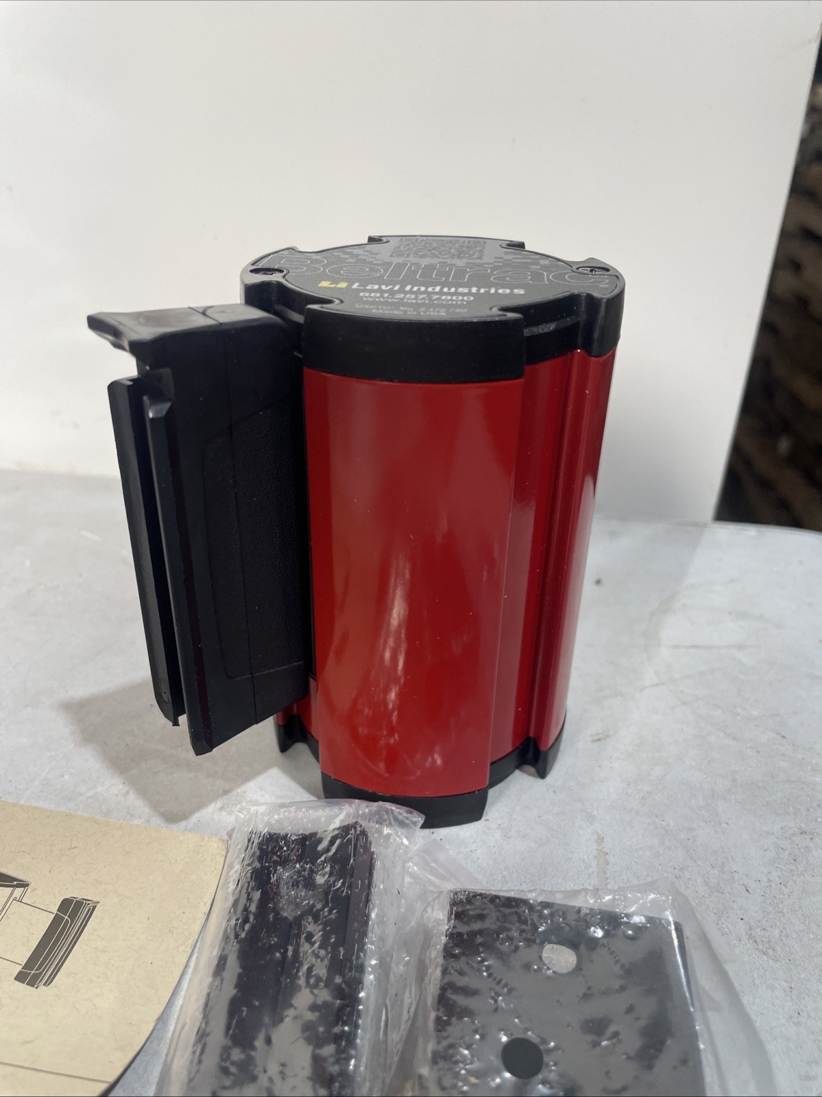 lavi industries 7-13 ft retractable belt wall mount danger live track